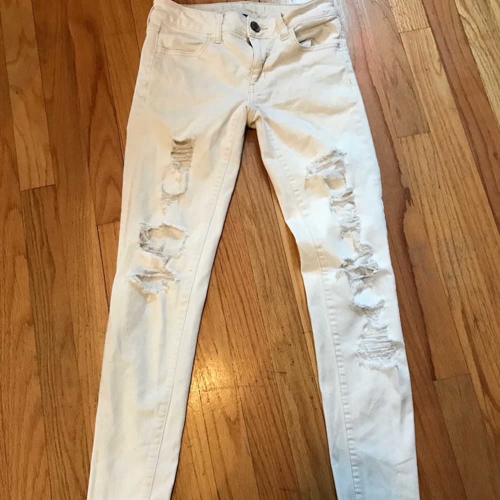 American Eagle off white ripped skinny jeans
